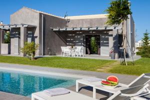 The swimming pool at or close to Villa Lefteris