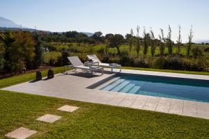 The swimming pool at or close to Villa Lefteris