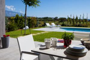 The swimming pool at or close to Villa Lefteris