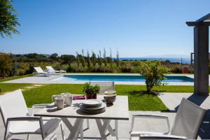 The swimming pool at or close to Villa Lefteris