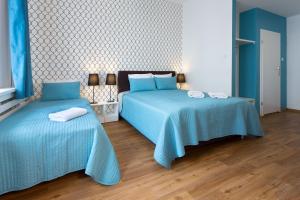 Hotel Traffic Poznań Stare Miasto客房内的一张或多张床位