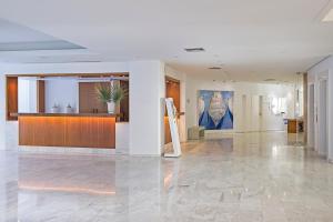 The lobby or reception area at Grecian Sands Hotel