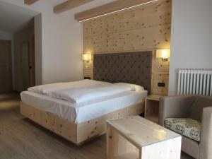 Katil atau katil-katil dalam bilik di Hotel Garni My Ledro