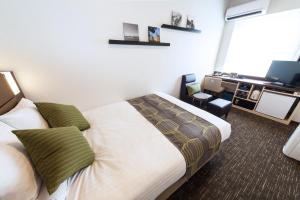 TV a/nebo společenská místnost v ubytování HOTEL MYSTAYS Haneda