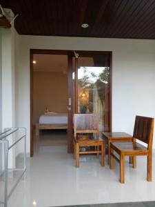 Imagen de la galería de Wisna House, en Sanur