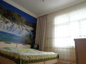 Postel nebo postele na pokoji v ubytování Guest House in Sarpi
