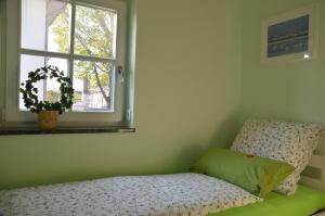 Ένα ή περισσότερα κρεβάτια σε δωμάτιο στο Ferienhaus Binz +105 φωτογραφίες