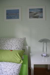 Un pat sau paturi într-o cameră la Ferienhaus Binz