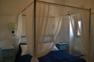 Postel nebo postele na pokoji v ubytování Terrazza Sui Trulli