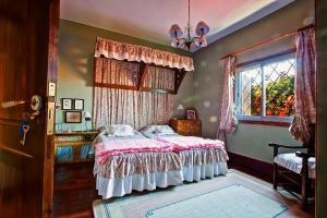 En eller flere senge i et værelse på Luxury Villa Golf Tenerife