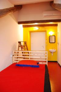 Postel nebo postele na pokoji v ubytování Attic Hostel Torino