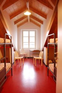 Postel nebo postele na pokoji v ubytování Attic Hostel Torino