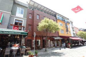 a street in a city with a building at Gul Sultan Hotel in Istanbul +29 photos