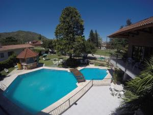 Bazén v ubytování Hotel Carlos Paz nebo v jeho okolí