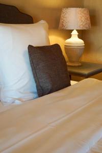 Postel nebo postele na pokoji v ubytování Boutique Hotel De Brakelhoen