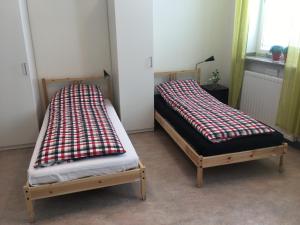 Säng eller sängar i ett rum på Hostel Finnmyrten