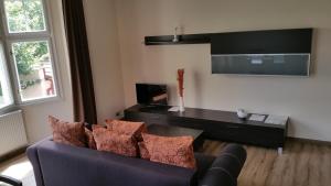 TV a/nebo společenská místnost v ubytování Villa Serena