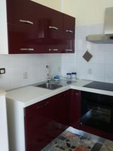 Kuchyňa alebo kuchynka v ubytovaní Conte Romita Apartment