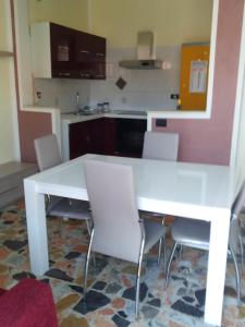 Kuchyňa alebo kuchynka v ubytovaní Conte Romita Apartment