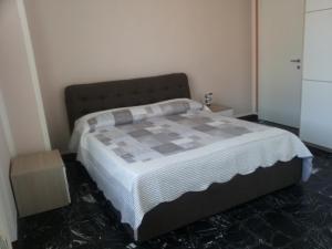 Posteľ alebo postele v izbe v ubytovaní Conte Romita Apartment