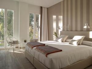Posteľ alebo postele v izbe v ubytovaní Hotel Boutique Balandret