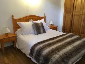 A bed or beds in a room at Vora Riu