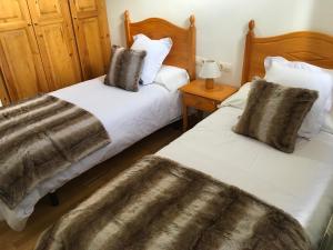 A bed or beds in a room at Vora Riu