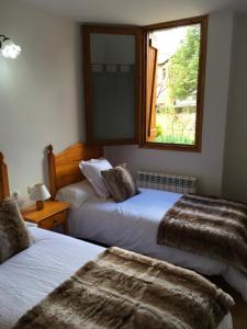 A bed or beds in a room at Vora Riu
