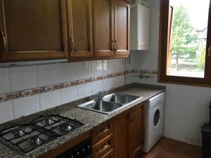 A kitchen or kitchenette at Vora Riu