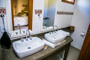 Um banheiro em Pousada Maritacas do Sana