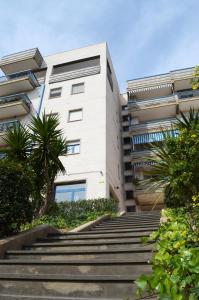a building with stairs in front of a building at La rosa di Rebecca in Monopoli