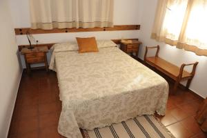 Łóżko lub łóżka w pokoju w obiekcie Apartamentos Rurales Monfragüe