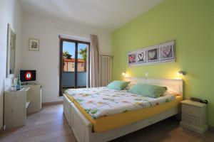 Letto o letti in una camera di Osteria Ticino by Ketty & Tommy