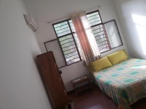 Postel nebo postele na pokoji v ubytování Hotel Orinoco Real