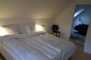 Postel nebo postele na pokoji v ubytování Mølvangvej 2 Jelling Apartment