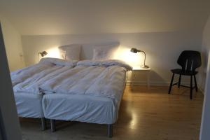 Postel nebo postele na pokoji v ubytování Mølvangvej 2 Jelling Apartment