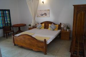 Postel nebo postele na pokoji v ubytování Embiente Guest House