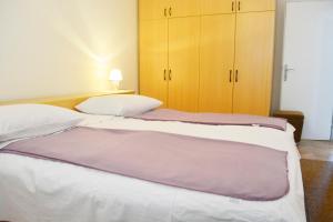 Posteľ alebo postele v izbe v ubytovaní Marin Apartment