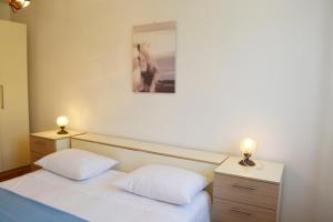 Posteľ alebo postele v izbe v ubytovaní Marin Apartment