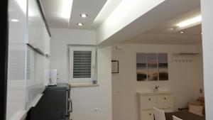 Kuchyň nebo kuchyňský kout v ubytování Gavza Luna Apartment