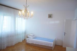 Posteľ alebo postele v izbe v ubytovaní Marin Apartment