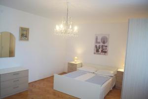 Posteľ alebo postele v izbe v ubytovaní Marin Apartment