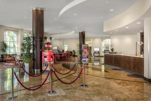 a lobby with a christmas ornament on the floor at Desert Palms Hotel & Suites Anaheim Resort in Anaheim +25 photos