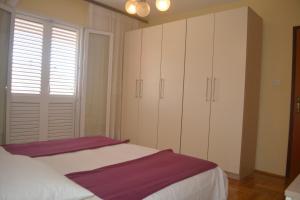 Posteľ alebo postele v izbe v ubytovaní Marin Apartment