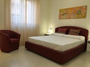 Postel nebo postele na pokoji v ubytování B&B Cafe' Fausu