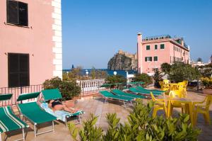 A view of the pool at Hotel Eugenio or nearby