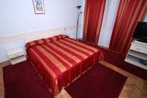 Postel nebo postele na pokoji v ubytování Hotel Narona