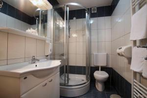 Koupelna v ubytování Hotel Narona