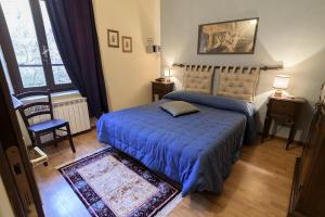 Postel nebo postele na pokoji v ubytování Hotel Relais Valle Orientina