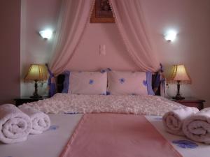 Ένα ή περισσότερα κρεβάτια σε δωμάτιο στο Villa Anastasia